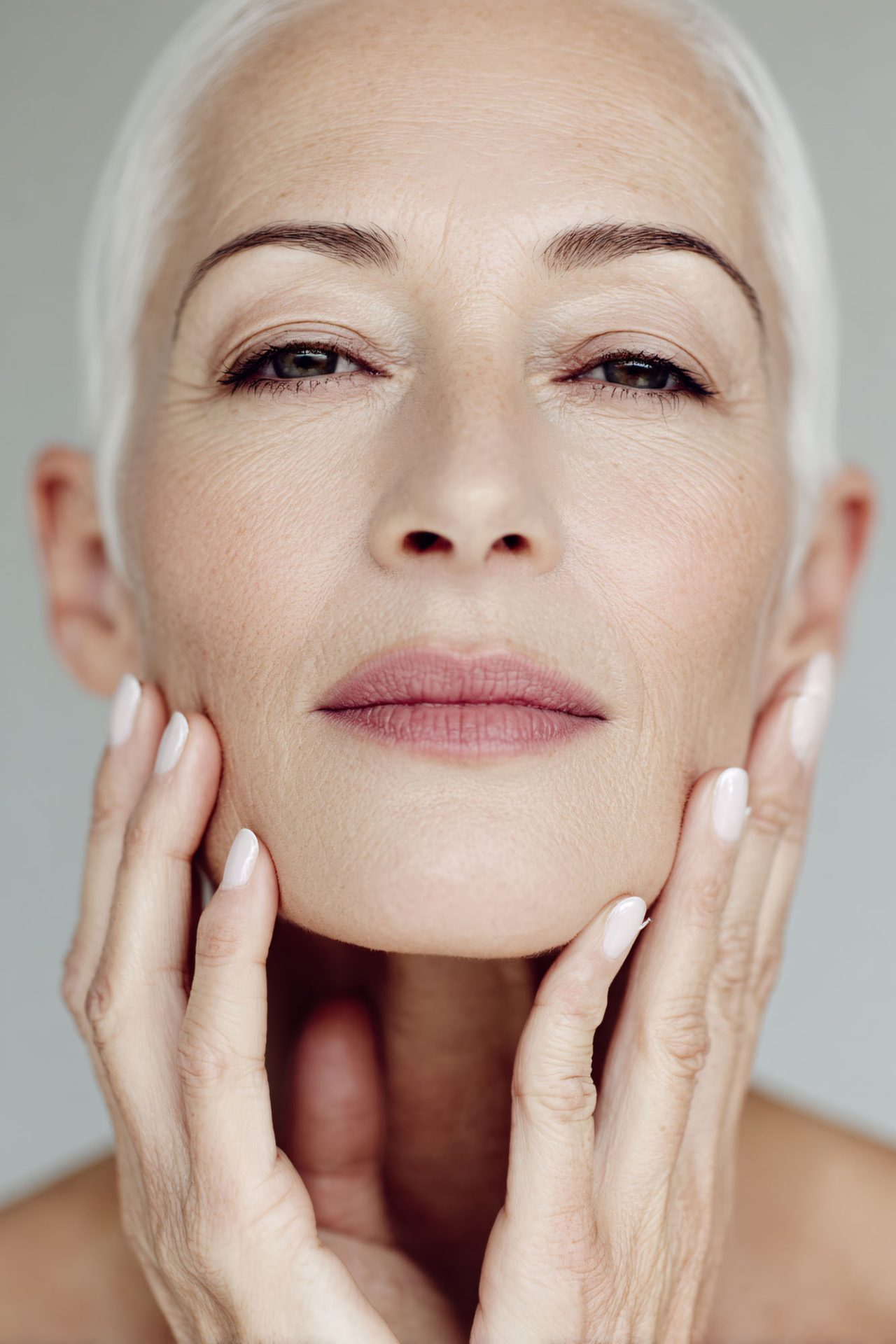 elegant woman with silver hair delicate facial features