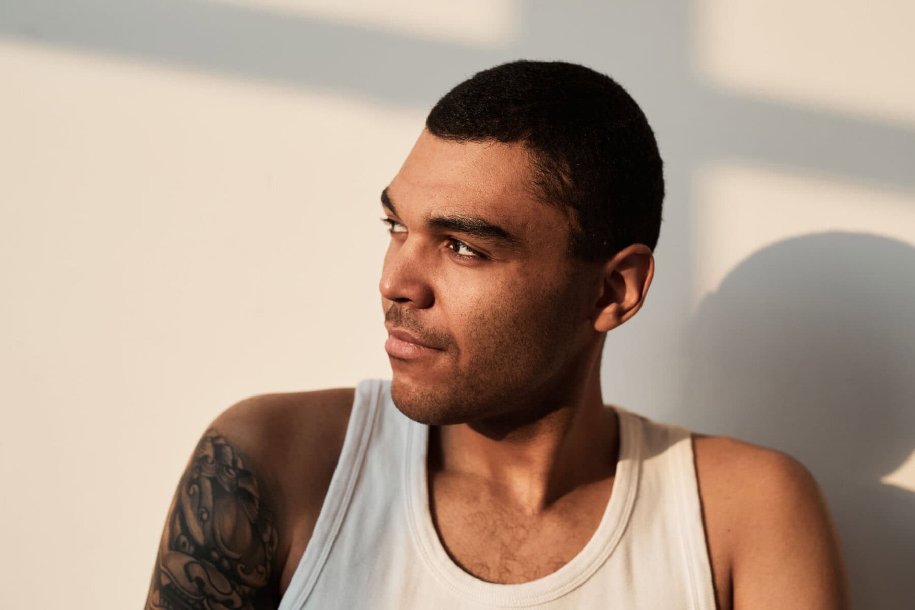 tough man in sunlight minimal