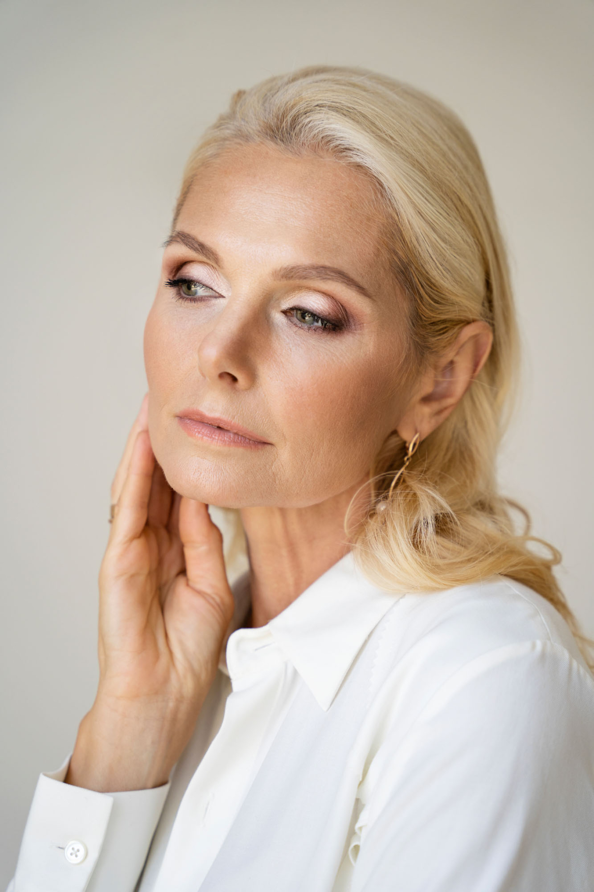 portrait middle aged blonde rich woman